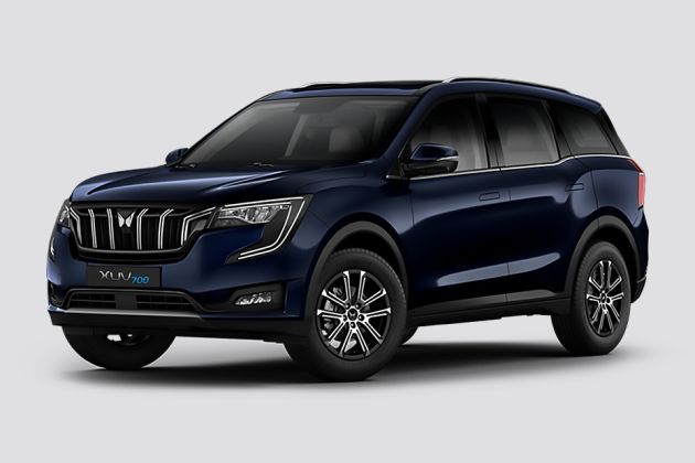https://stimg.cardekho.com/images/carexteriorimages/630x420/Mahindra/XUV700/10794/1762509966753/front-left-side-47.jpg